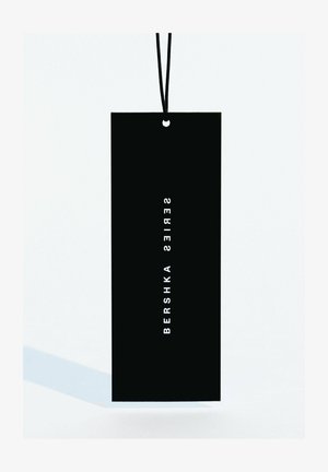 Black rectangular tag with a vertical orientation, featuring white text reading "BERSHKA SERIES." Includes a black hanging string.