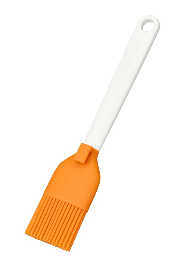 Silikon-Backpinsel mit orangen Borsten und Kopf, weißem Griff mit Aufh Locha, verwendet zum Kochen und Backen.