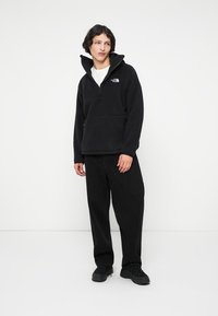 The North Face Flīsa džemperis - black
