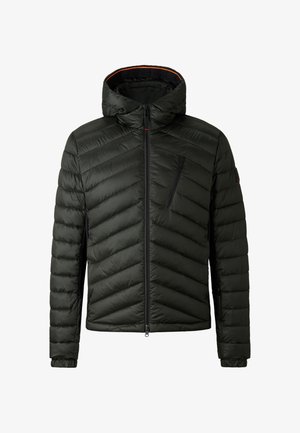 Grüne gepolsterte Jacke mit einem Zickzack-Steppmuster, mit Reißverschluss vorne, Kapuze und einer Brusttasche. Sie verfügt über schwarze Reißverschlüsse und ein kontrastierendes Innenfutter.