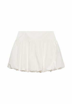 Bílá balónová sukně s širokým pasem a nařasenou látkou vytvářející nadýchaný tvar.