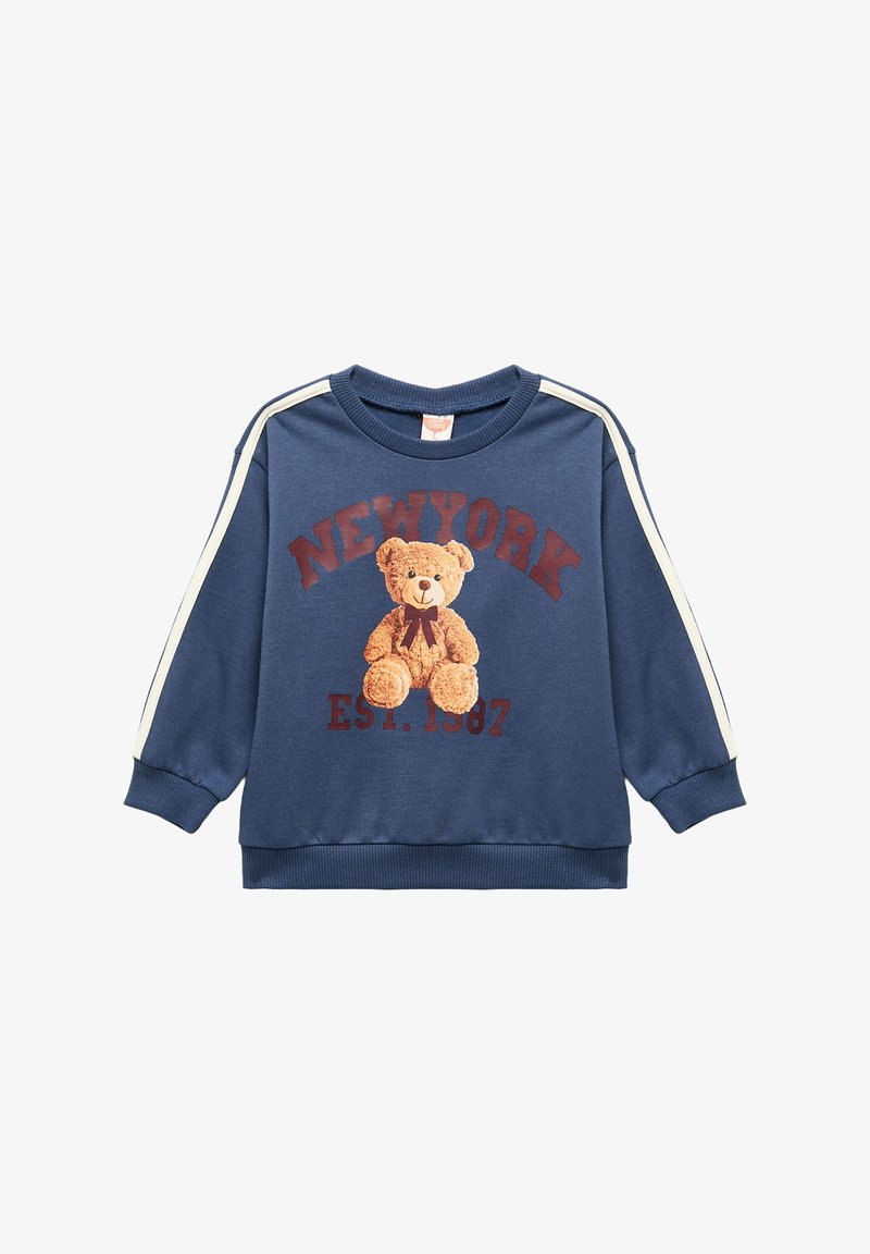Felpa blu navy con maniche lunghe, caratterizzata da strisce laterali crema, una grafica di un orsetto e il testo "NEW YORK EST. 1987" in bordeaux.
