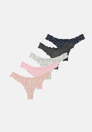 Five women's ruffled thong panties in navy floral, solid gray, white floral, solid pink, and peach floral patterns arranged diagonally.