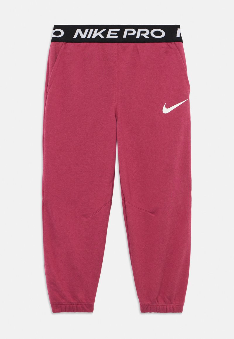 Spodnie dresowe Nike Pro w kolorze różowym, wykonane z miękkiego materiału. Posiadają czarny elastyczny pasek w talii z napisem "NIKE PRO" oraz białym logo.