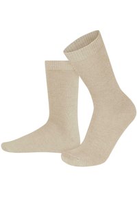 Beige Baumwollsocken mit einem gerippten Bündchen, einfarbiger Textur und Knöchellänge. Mit verstärkter Fußspitze und Ferse für zusätzliche Haltbarkeit.