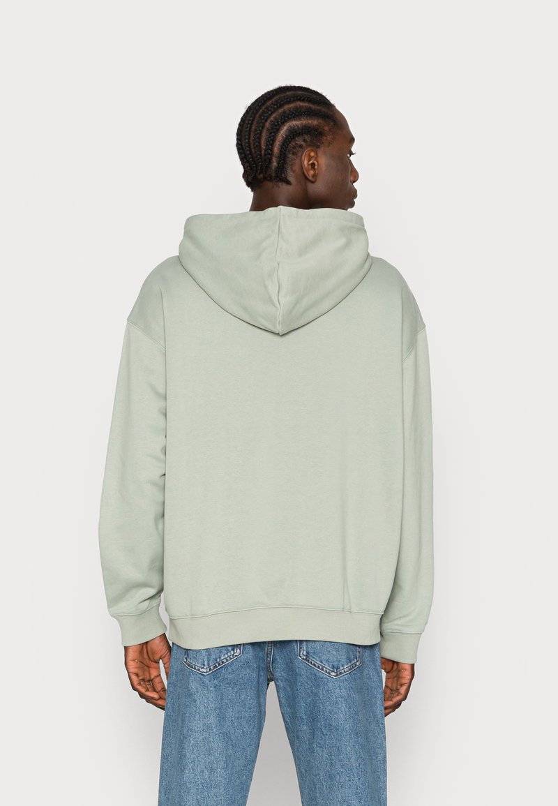 Weekday OVERSIZED HOODIE - Sweat à capuche - light green/vert clair -  ZALANDO.FR