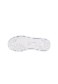 White sneaker sole with a textured grip pattern. Features a smooth border and a central indentation for added traction.