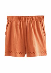 Rustrøde shorts med elastisk talje, sidelommer og bølget kant med udskæringer. Blød, glat tekstur.