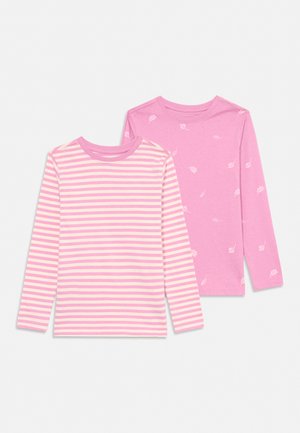 Two long-sleeve children's shirts: one pink with white horizontal stripes, the other solid pink with small white leaf patterns.
