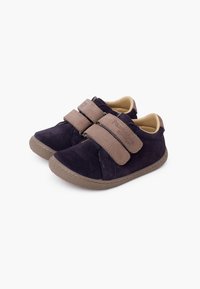 Navy suede shoes with brown Velcro straps, round toe, and textured rubber sole. Features padded collar and logo detail on straps.