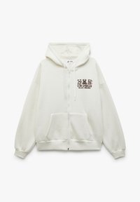 Vit zip-up hoodie med framfickor, dragsko på huvan och brun grafisk design av tre teddybjörnar med texten "LOS ANGELES Beverly Hills 1988" på bröstet.