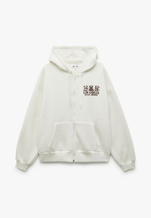Hvid zip-up hættejakke med frontlommer, snoretræk ved hætten og brun grafik af tre bamser med teksten "LOS ANGELES Beverly Hills 1988" på brystet.