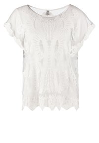 Valkoinen läpikuultava paita, jossa on kukkakirjontaa, lyhyet liehuvat hihat, aaltoileva helma ja pyöreä pääntie.