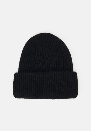 Black ribbed knit beanie with a folded cuff. Made of a soft, textured material, offering warmth and a snug fit.