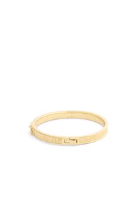 Gold bangle bracelet with a textured band, featuring a rectangular clasp. Smooth finish and circular shape, suitable for casual or formal wear.