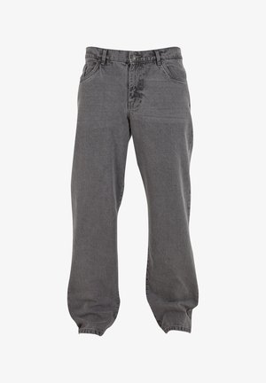 Grijze spijkerbroek met een ontspannen pasvorm. Beschikt over vijf zakken, knoopsluiting en lichte vervaging aan de voorkant voor textuur.