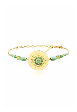 Bracelet chaîne en or avec un centre rond en or comportant des perles turquoise et vertes et un motif rayonnant autour d'une pierre turquoise centrale.