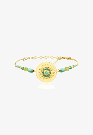 Bracelet chaîne en or avec un centre rond en or comportant des perles turquoise et vertes et un motif rayonnant autour d'une pierre turquoise centrale.