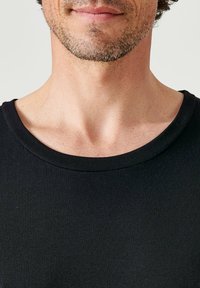 Damart COL ROND FINE SENSITIVE MANCHES LONGUES - Unterhemd/-shirt - noir