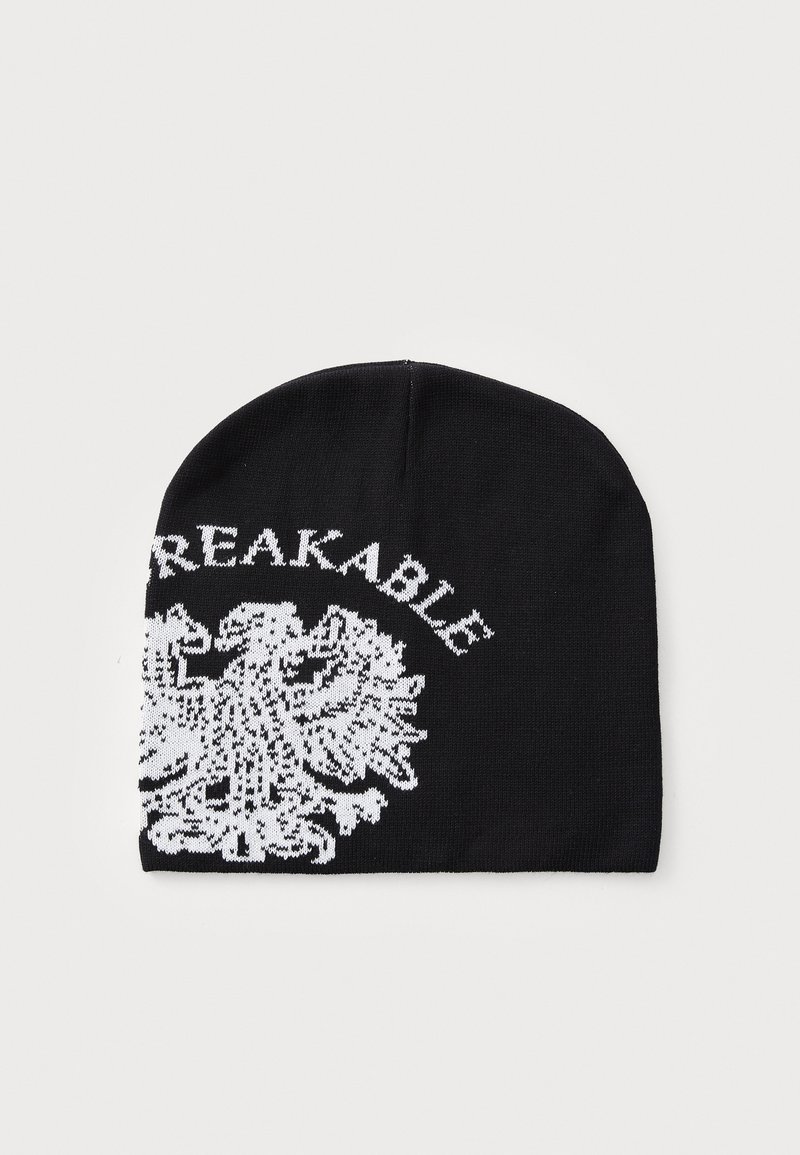 Beanie in maglia nera con una grafica bianca di un'aquila bicefala e la parola "BREAKABLE" sopra di essa.