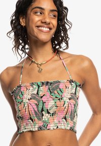 Geraffineerde crop top met kleurrijk bloemenpatroon, met verstelbare bandjes en een ronde halslijn. Het materiaal lijkt lichtgewicht en gestructureerd te zijn.
