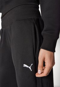 Puma LOUNGEWEAR TRACKSUIT SET - Tracksuit - black