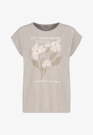 Helles beiges Baumwoll-T-Shirt mit kurzen Ärmeln. Mit einem Blumengrafik in Creme und Taupe, mit dem Text: "LASS DAS GLÜCK WACHSEN."