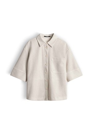 Beige kurzärmliges Hemd mit Knopfleiste, spitzem Kragen, Brusttasche vorne und strukturierter Waffelstrick-Optik.