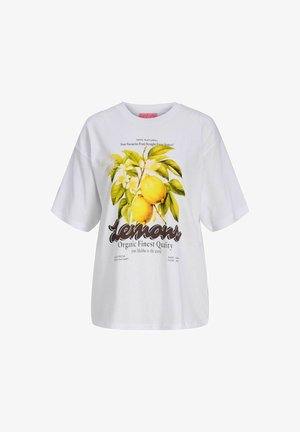 T-shirt blanc avec une illustration de citrons jaunes et de feuilles vertes, accompagné d'un texte promouvant les citrons biologiques et leur fraîcheur de qualité.