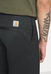 Carhartt WIP BROOKER PANT  - Pantaloni - black rigid