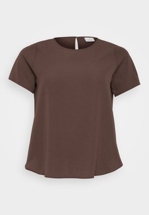 Brun kortermet topp med rund halsringning og en liten utskjæring bak. Laget av mykt stoff med en lett utstående nederkant.