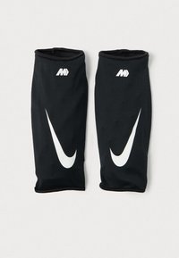 Sorte kompressionsærmer lavet af åndbart mesh-stof, med et stort hvidt Nike swoosh og logo på hver ærme.