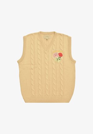 Beige kabelstrikket ærmeløs sweater med V-udskæring og broderet blomsterdesign med røde og pink blomster på venstre bryst.