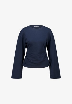 Marineblauwe langemouwen shirt van zachte katoen, met een ronde halslijn, een losse fit en geplooide details aan de onderkant.