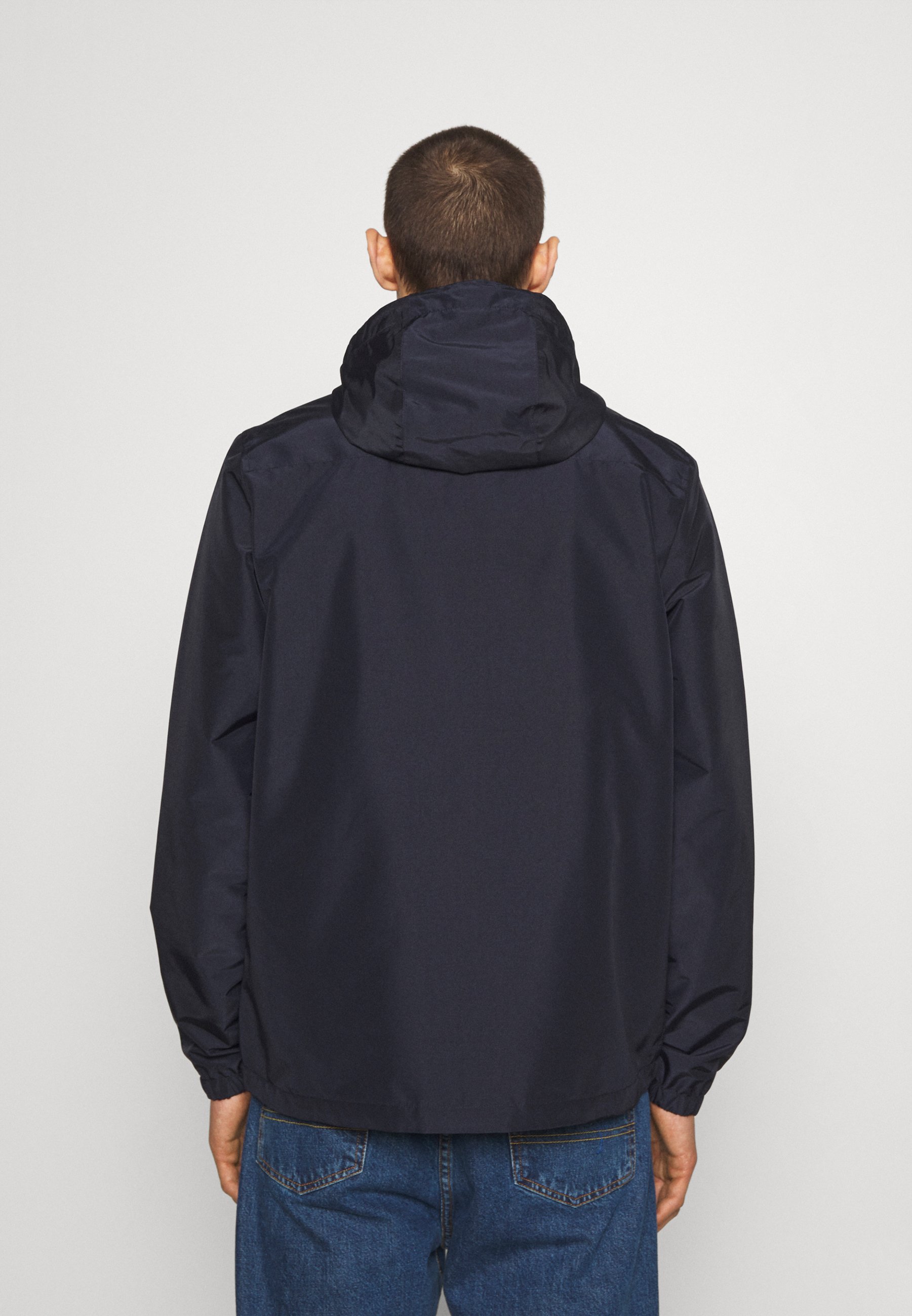 white lightweight jacket