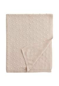 Coperta lavorata a maglia di colore beige chiaro con un motivo a punti testurizzati, rifinita con bordi a costine. Misura circa 120 x 150 cm.