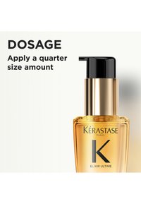 Kérastase Elixir Ultime Haaröl-Flasche mit Pumpe, neben dem Text: „Dosierung Eine viertelgroße Menge auftragen“ auf weißem Hintergrund.