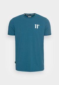 Blå kortärmad t-shirt i bomull med rund hals och vit "11°" logotyp på vänstra bröstet.