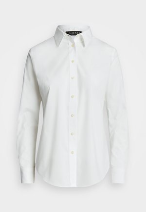 White long-sleeve button-up shirt made of cotton. Features a classic collar, seven buttons, and a subtle logo embroidered on the chest.
