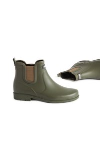 Bottes de cheville en caoutchouc vert avec des panneaux latéraux élastiques et des semelles texturées. Fini lisse avec un logo sur le côté extérieur.