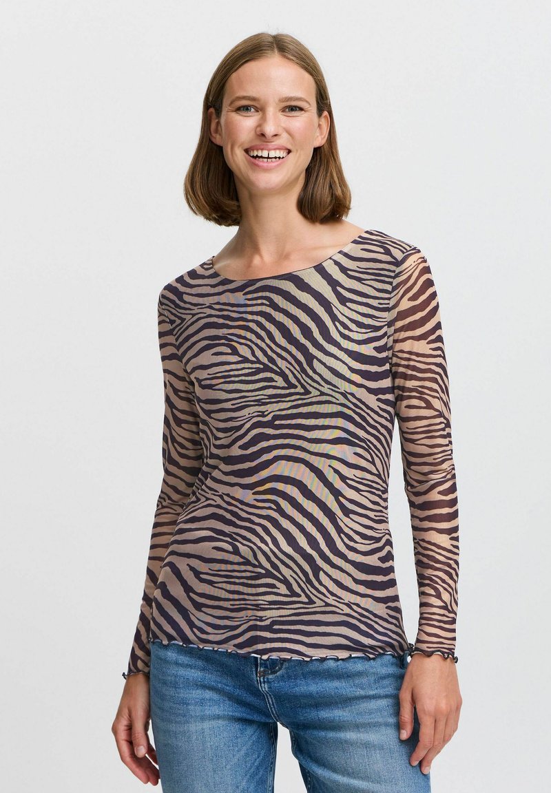 Langærmet top i gennemsigtigt stof med et mønster af beige og brune zebra-striber, med rund halsudskæring og bølget kant.