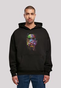 Felpa nera con cappuccio caratterizzata da una grafica colorata di un casco di Stormtrooper con dettagli di vernice spruzzata, una tasca frontale e cappuccio con cordini.