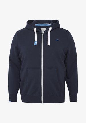 Mornarska majica s patentnim zatvaračem od mješavine pamuka. Ima bijele špage, prednje džepove, rebraste manžete i mali logo na prsima.