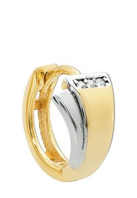 Boucle d'oreille créole en or et argent avec une finition polie, présentant un design ondulé et trois petites pierres claires incrustées d'un côté.