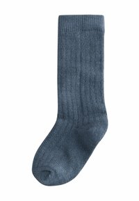 Chaussette bleue côtelée en matériau doux, présentant un design classique montant jusqu'au genou avec un renforcement au niveau des orteils et une texture douce.