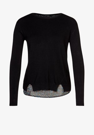 Schwarzer langärmeliger Pullover mit rundem Ausschnitt, ausgestattet mit einem gepunkteten Saum und seitlichen Schlitzen für zusätzliche Details.