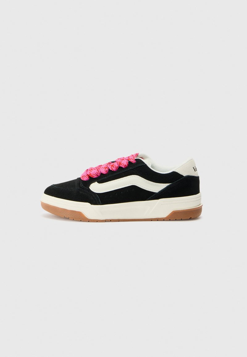 Black suede sneakers with cream accents and a rubber gum sole. Features thick pink laces and a low-top design. Ventilation holes on the sides.