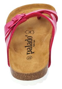 Infradito sintetici rosa con soletta in sughero. Presentano una fascia regolabile e una texture imbottita, con il nome del brand stampato sulla soletta.