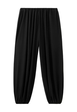 Pantalon ample noir avec taille élastique et poignets élastiques, fabriqué en tissu léger.