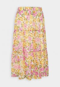 Jupe longue fluide avec taille élastique, présentant un design à volants et un motif floral multicolore aux tons roses, jaunes et verts.